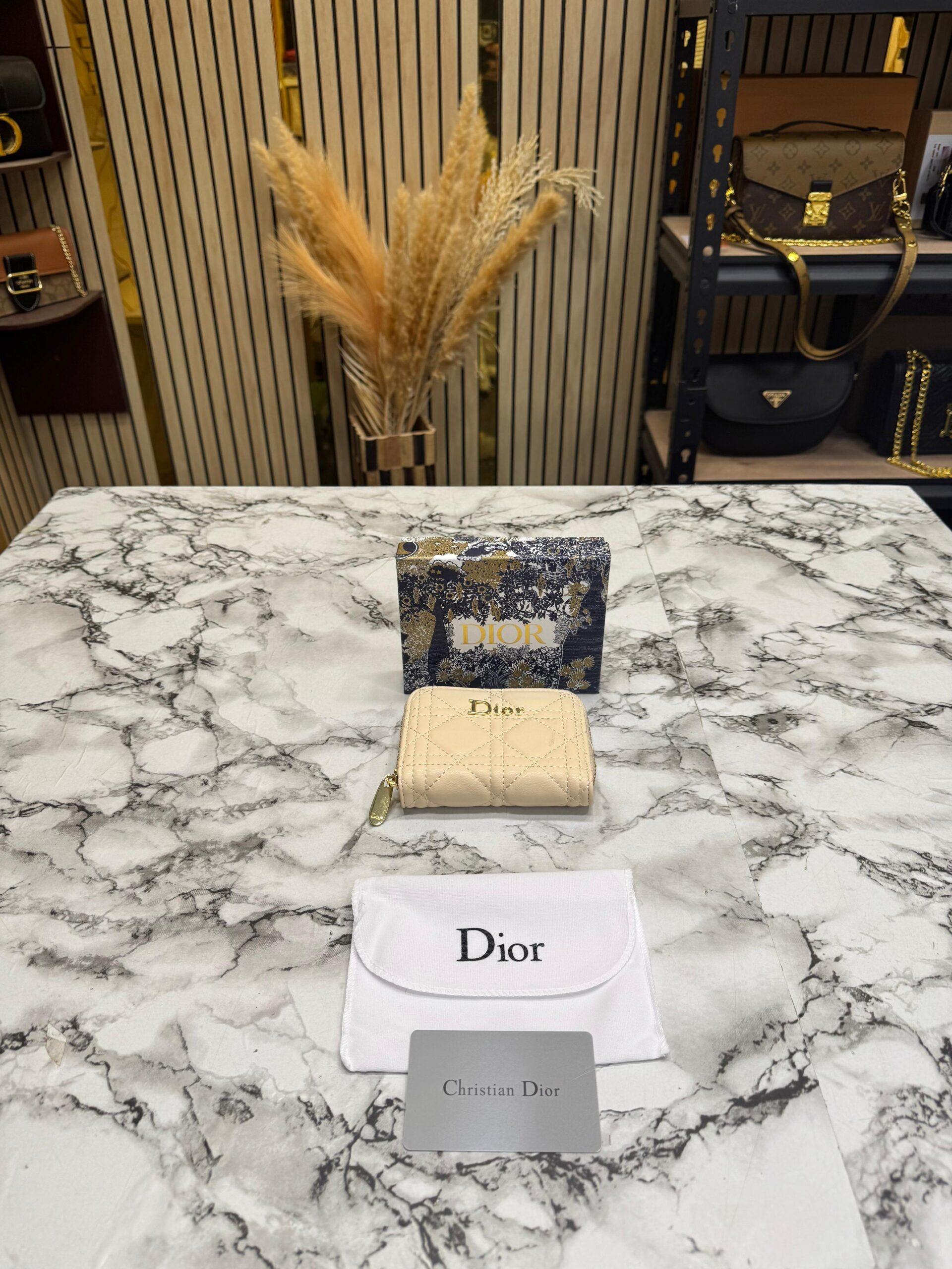 693161e9acef90 (1) DIO_R CANNAGE QUILTED ZIPPER WALLET INCLUDES BOX AND DUST BAG (DXD001-BEIGE) - Image 1